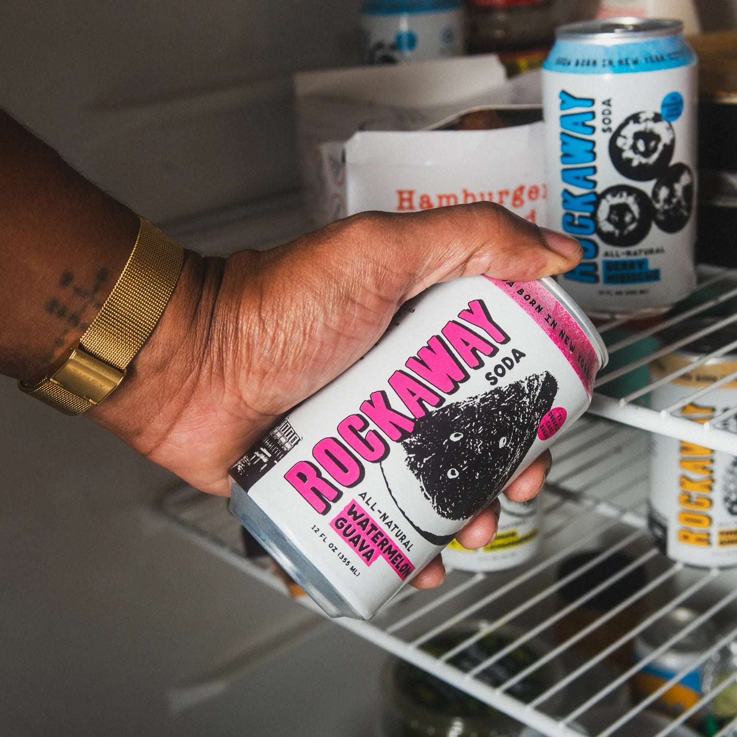 Watermelon Guava Rockaway Soda Can in hand